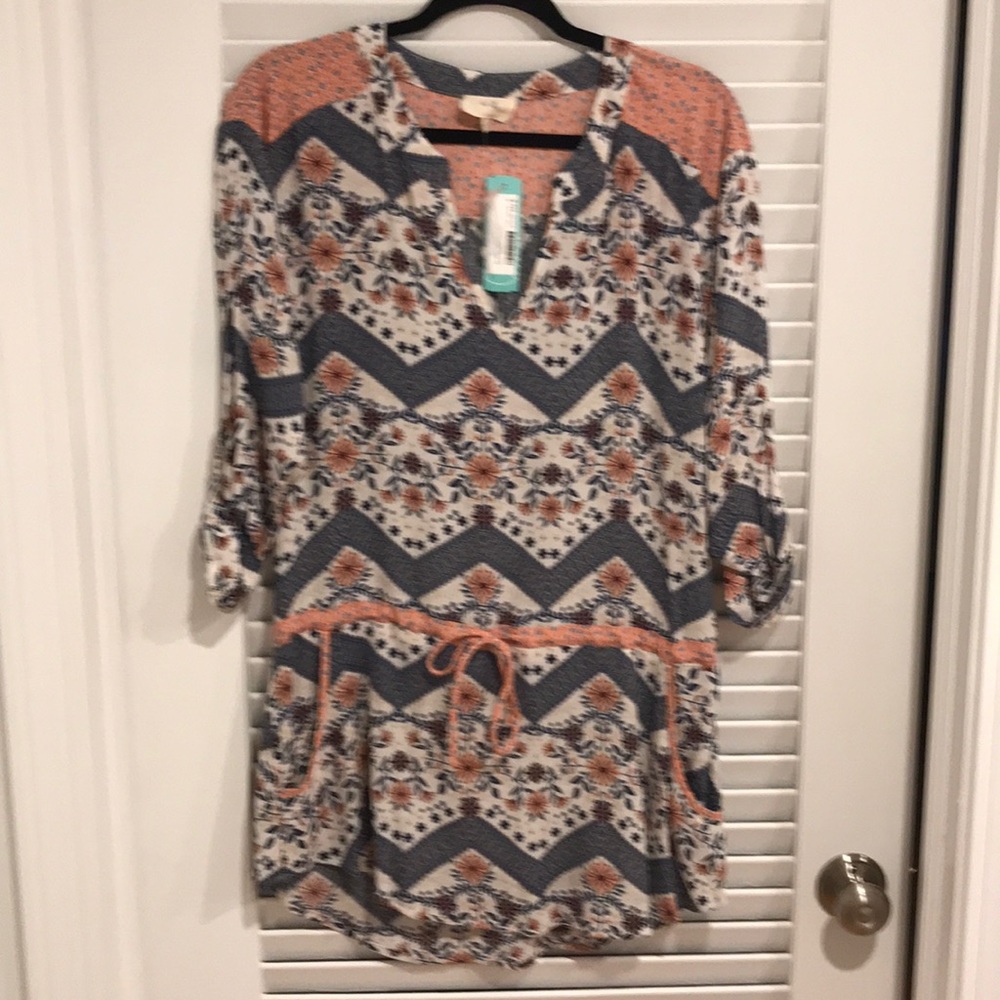 Tunic top with tie waist and pockets